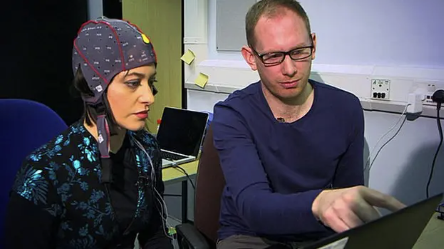 Teaching L.J Rich how to control the BCMI using her brainwaves LJ Rich and Joel using the BCMI