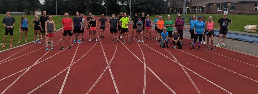 Coaching track sessions with Seaford Striders running track with seaford striders